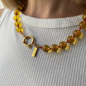 Bolas de cristal amarillo con cordon
